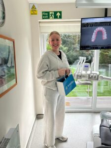 Happy Invisalign patient at Confident Smile Shepperton