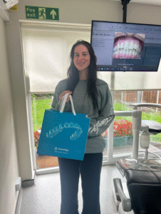 Happy Invisalign patient at Confident Smile Shepperton