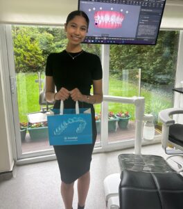Happy Invisalign patient at Confident Smile Shepperton