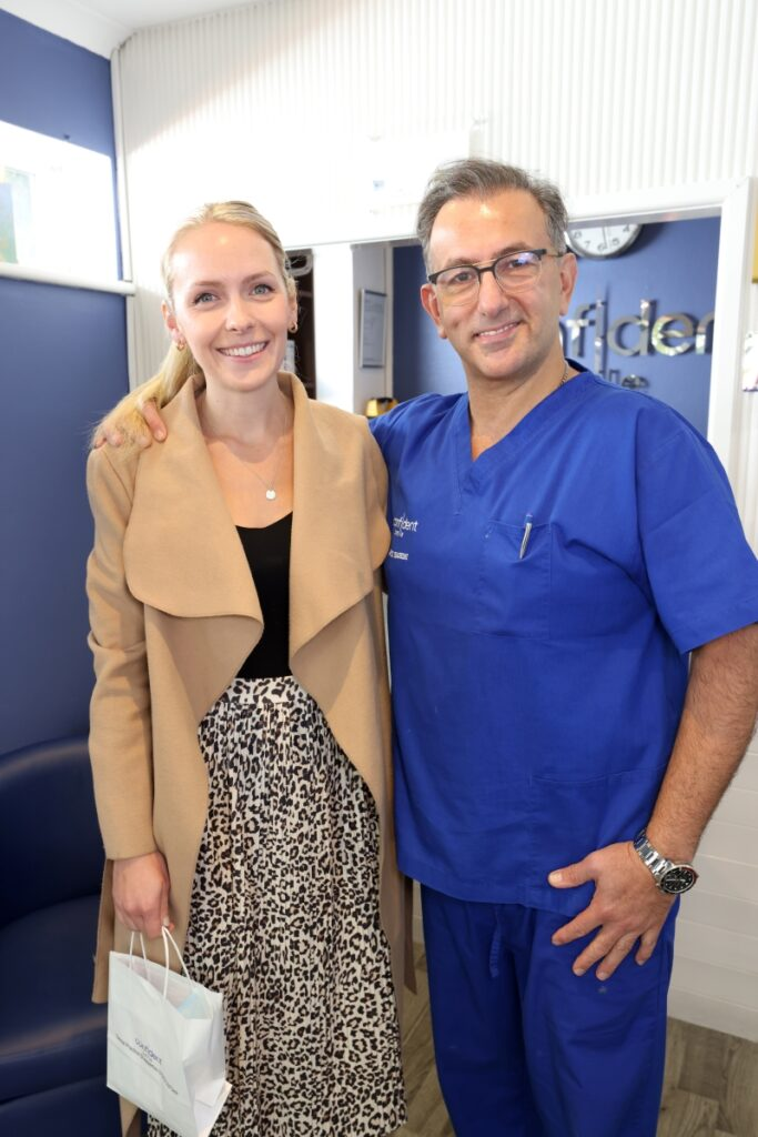 Dr Alex Hashemi with a happy Invisalign patient at Confident Smile Shepperton