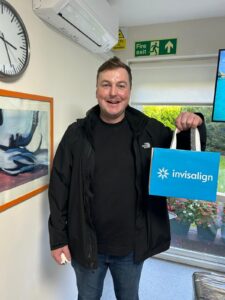 Happy Invisalign patient at Confident Smile Shepperton