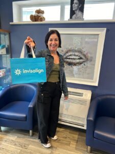 Happy Invisalign patient at Confident Smile Shepperton