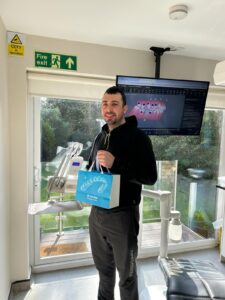 Happy Invisalign patient at Confident Smile Shepperton