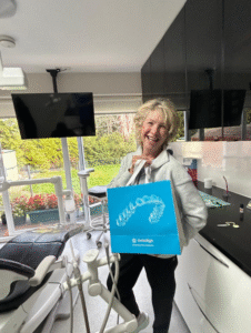 Happy Invisalign patient at Confident Smile Shepperton