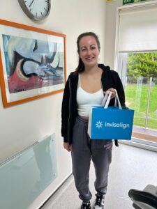 Happy Invisalign patient at Confident Smile Shepperton