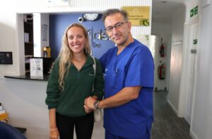 Patient with their Invisalign dentist at Confident Smile